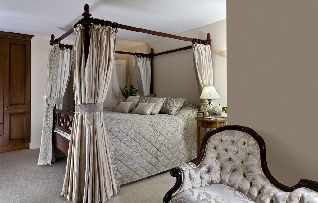 Principal bedroom, quiet linens and heirloom timber — House, Waterville, Co. Kerry